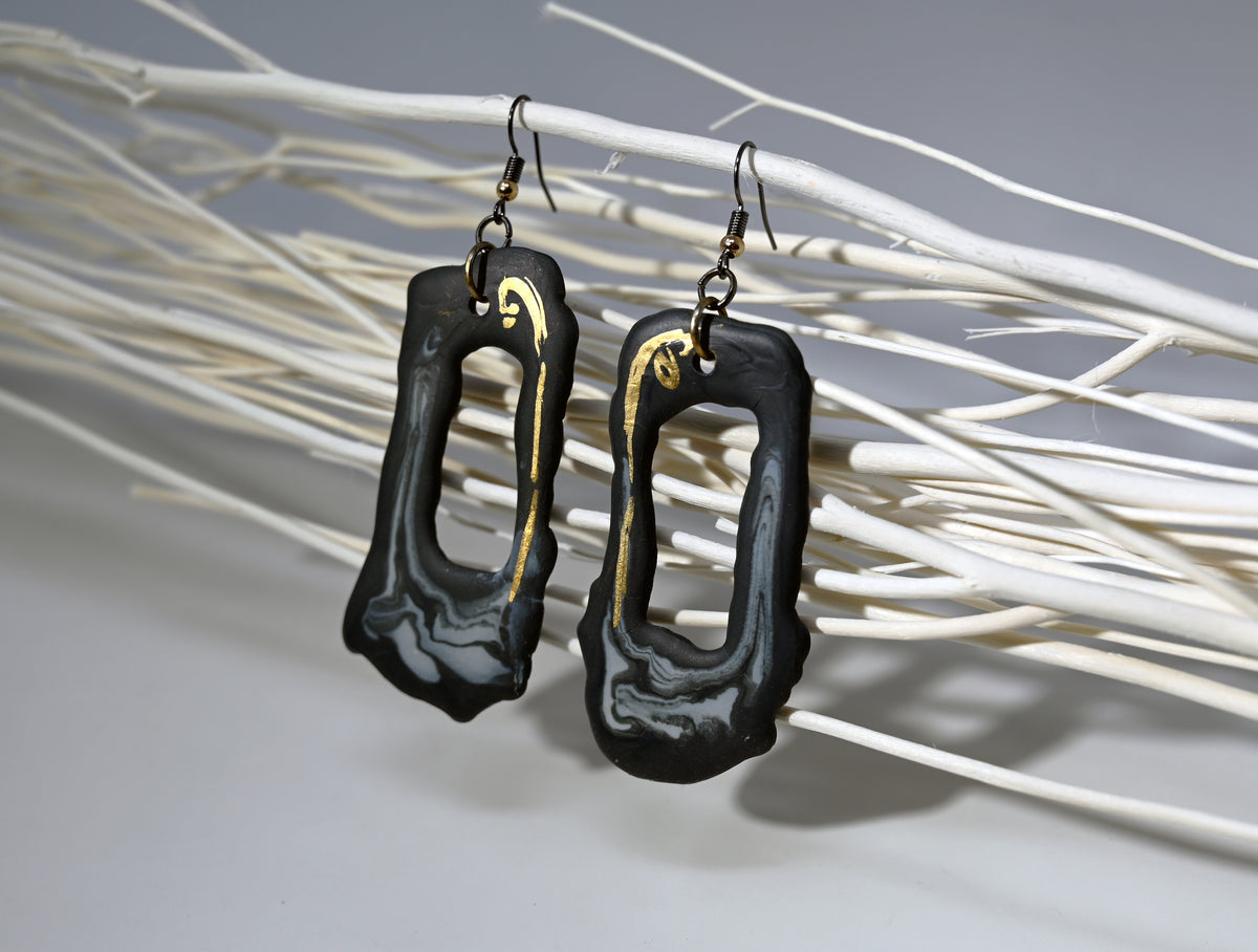 Elongated Open Black Porcelain Earrings with Marble and Gold Accents